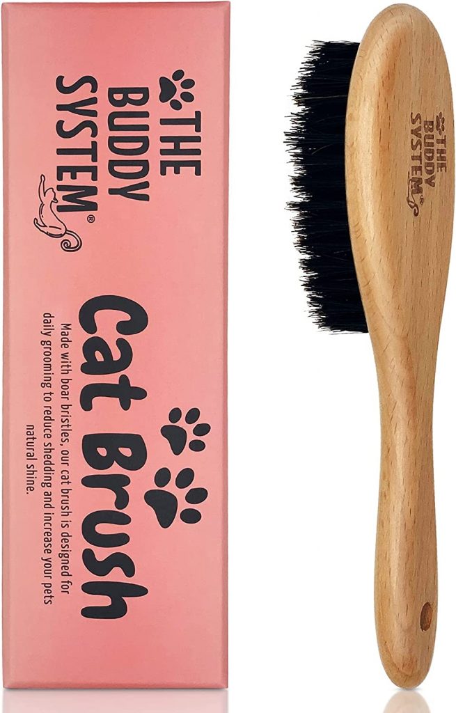 The Buddy System Cat Brush With Boar Bristle and Wooden Handle comes with a boar bristle and has a wooden handle perfect for grooming your cat. This brush is a professional-grade grooming tool for removing soft hair and reducing shedding in pets' skin.